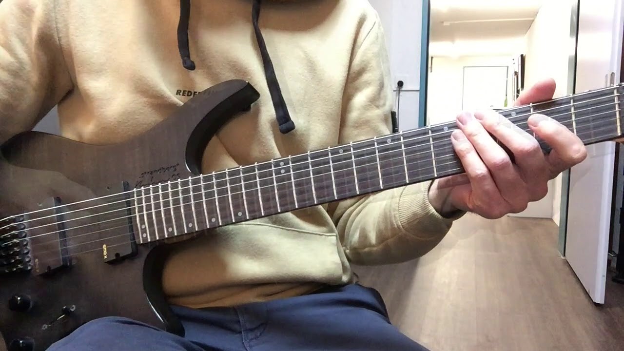 YouTube thumbnail: guitarist playing the Strange Deja Vu interlude riff by Dream Theater