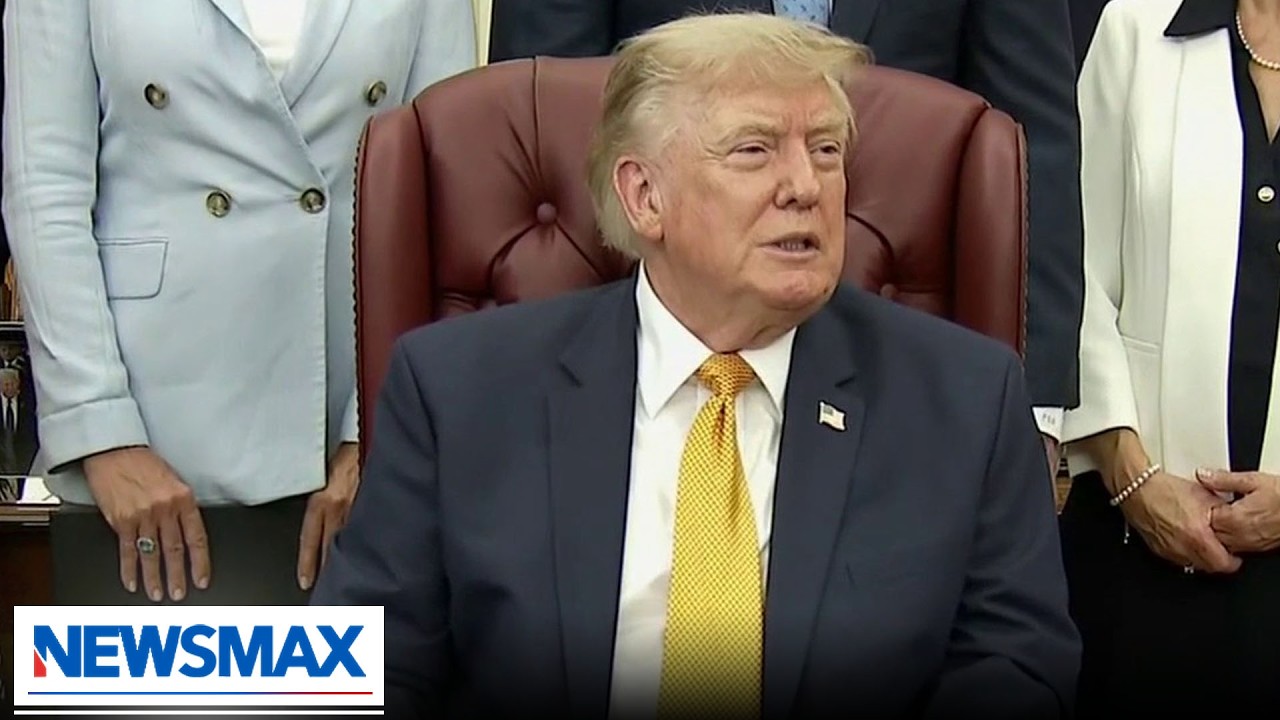 'We love our military': Trump talks Iran, socialism, signs military spouse executive order