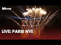 LIVE Paris Rings In The New Year With Fireworks Over The Arc De Triomphe