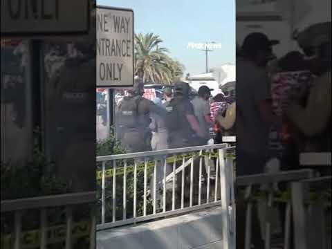 STANDOFF: Protesters swarm federal agents during raid, prompting SWAT team response #shorts #us
