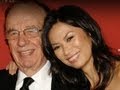 Murdoch splits with wife, splits up company