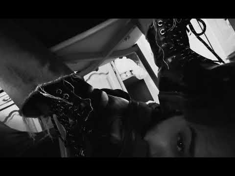 Boots Trampling Face Under Chair