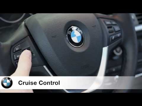 Part of a video titled Tutorial: Multifunctional Buttons On Your BMW Steering Wheel - YouTube