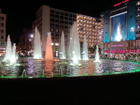Omonia Square fountain baths in Indian Tricolour on India's 75th Independence Day.