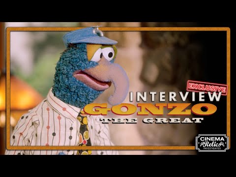 Gonzo and Dave Goelz examine Muppet Movie artifacts