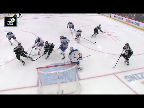 Jack Hughes scores a goal against the Buffalo Sabres