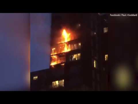 Manchester tower block flames spread as rescuers tackle fire