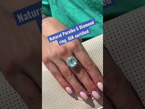Paraiba tourmaline copper bearing diamonds ring. GIA certified. 14k white gold. www.goldaevo.com