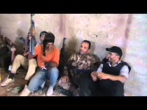 استراحة لعناصر كتيبة شهداء صيدا أثناء معركة السيطرة على سنتر البرنس في درعا