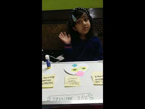 Vedanshi Singh doing school activity and topic is 'Save Animals'.
