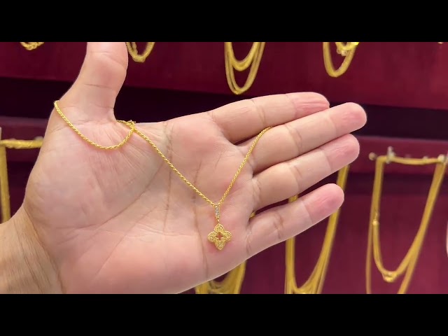 عقد تصميم عالمي ذهب عيار 21