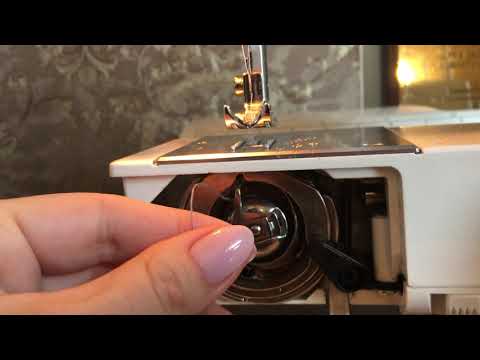 Как заправить нижнюю нить в швейной машинке
