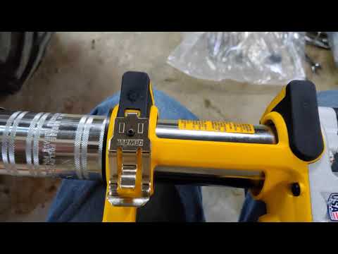 Loading a Dewalt Battery powered Grease gun