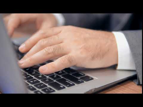 mixkit hands of a man typing on a laptop 4827
