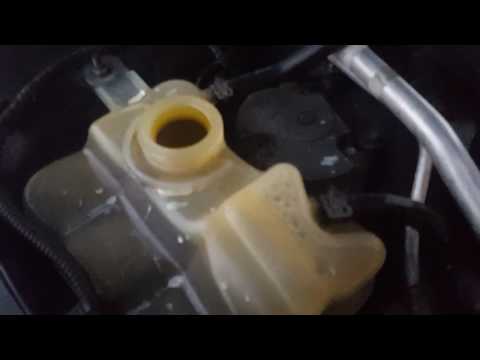 How to replace the radiator resavor cap on a lincoln mkz and zephyr