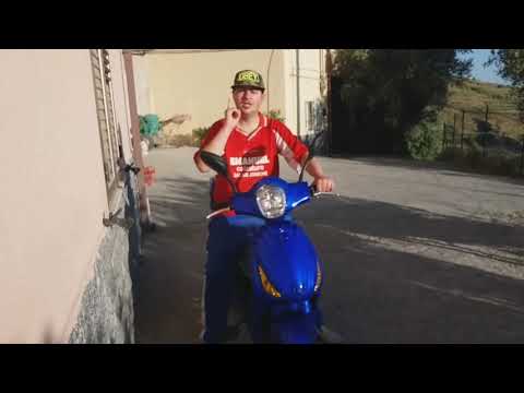 Enrico Pasquale Pratticò sul Motorino Elettrico Senza Targa il vero(video dell'anno vecchio fuori )