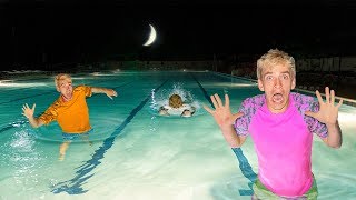 EXPLORING ABANDONED POOL at 3AM!! (Pond Monster Spotted)