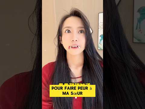 Je mets une fausse dent pour faire peur à ma sœur.