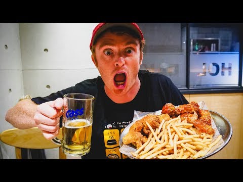 Vida noturna coreana em Seul Comer KFC (frango frito coreano) + cerveja coreana e Soju