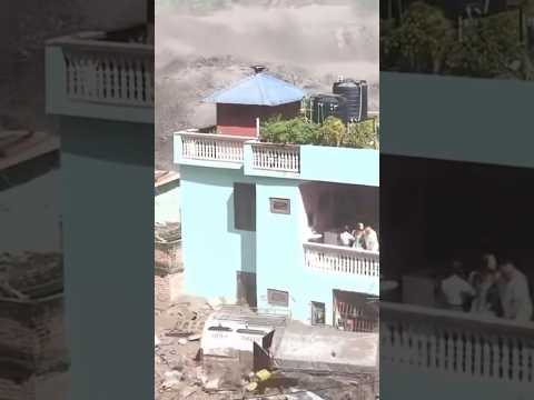 House nearly engulfed by Nepal floodwaters