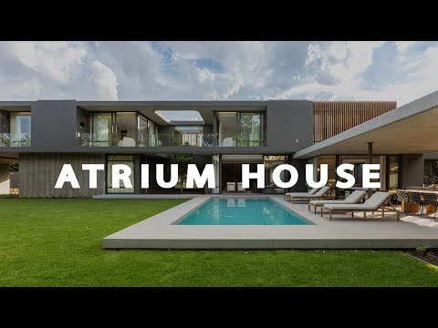 Step Inside the Enchanting Atrium House: Where Nature Meets Contemporary Living (House Tour)