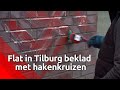 Tientallen rode hakenkruizen op flat in Tilburg