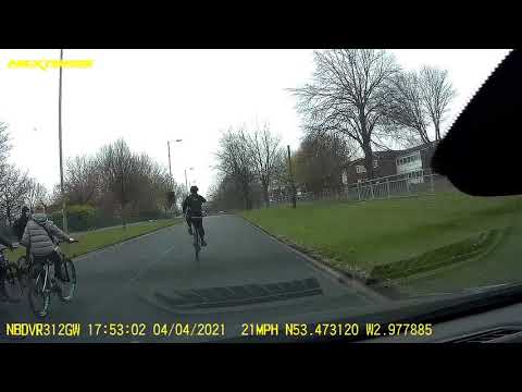 Dashcam - Liverpool, UK - Cyclists across the whole road
