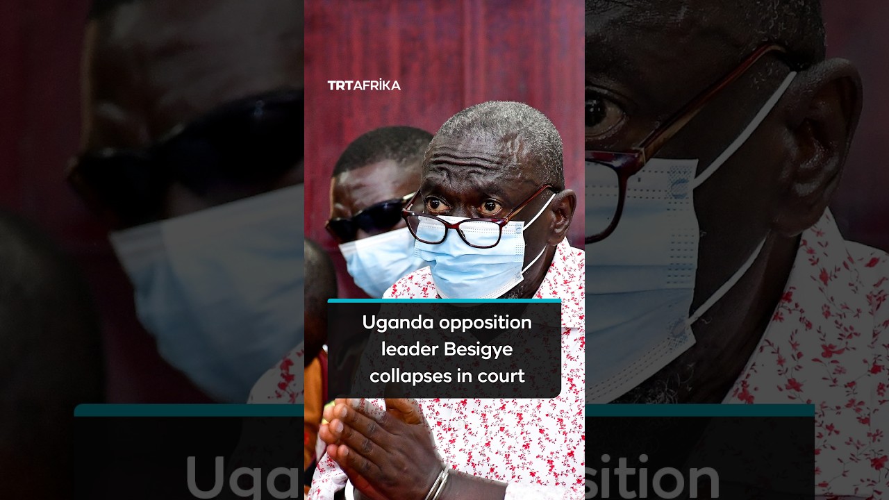 Ugandan opposition leader Kizza Besigye collapses in court, surrounded by security personnel, highlighting his medical emerge