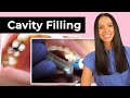 Dentist Filling A Cavity Between Teeth