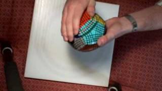 There's even instructions on how to make one yourself! In case you decide to squander your life away by gluing tiny stickers on a metal orb.