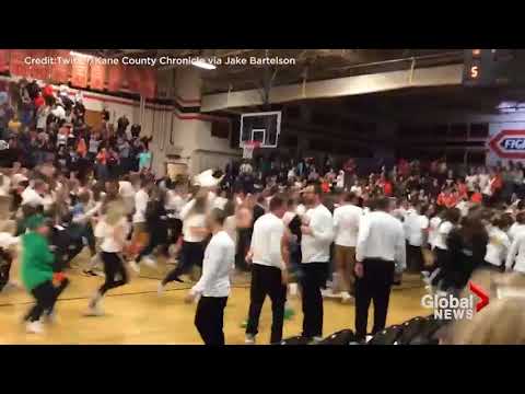 High school crowd goes wild after improbable buzzer beater wins game