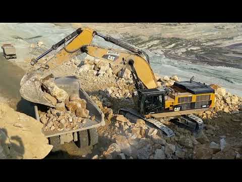 Caterpillar 390D Excavator Loading Caterpillar Dumper And Trucks - Pyramis Ate