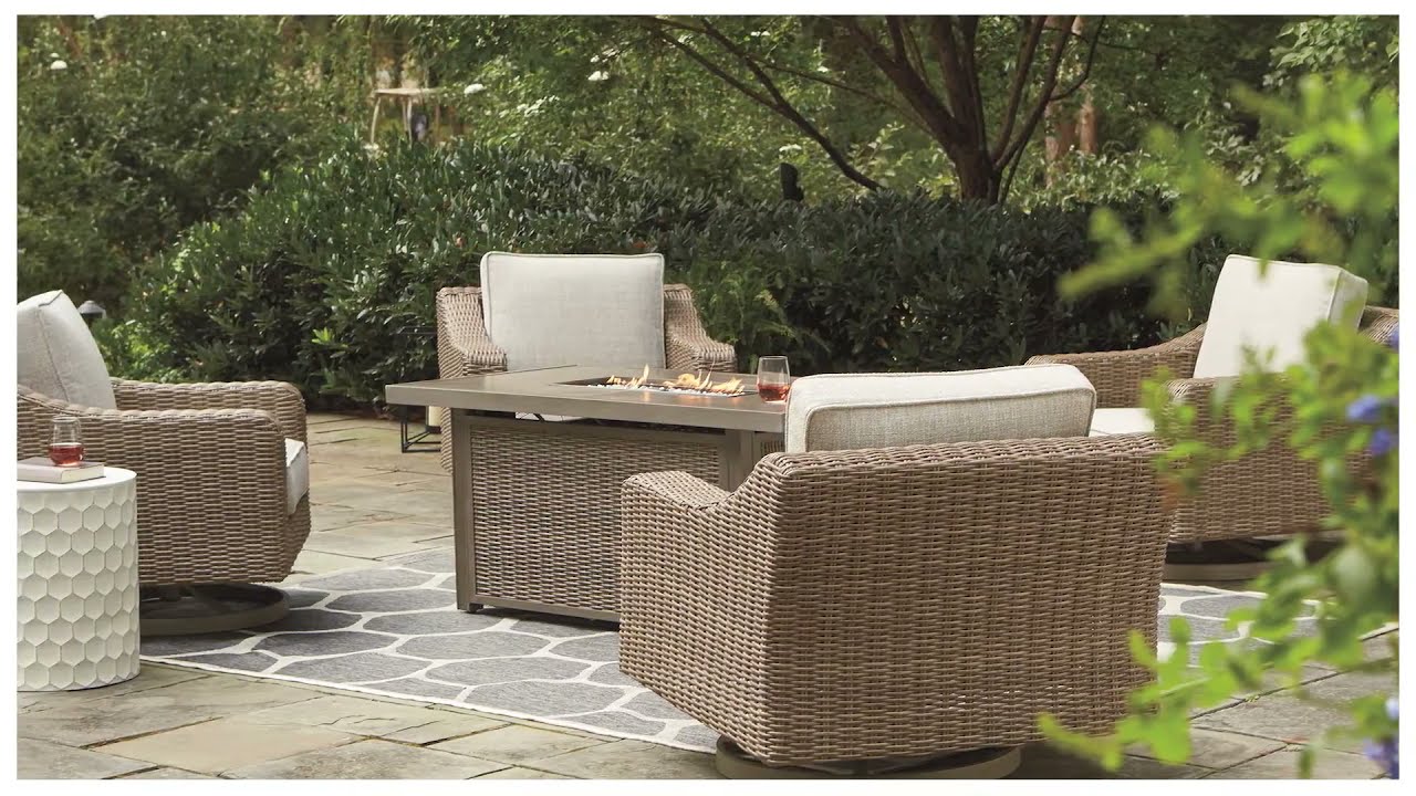 Beachcroft Beige Outdoor Sofa with Cushion from Ashley Coleman Furniture