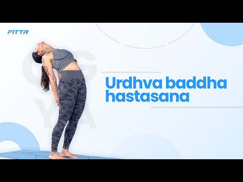Urdhva baddha hastasana/ Mountain pose with bound hands overhead.