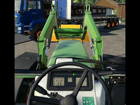 Farming Simulator a womble gets shown how to reverse park a trailer first time