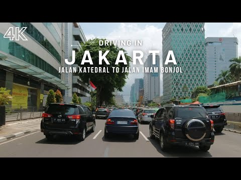 Driving in Downtown Jakarta on a Sunny Day -  Thamrin, Bundaran HI - Jakarta 4K