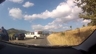 preview picture of video 'Kalavryta crash aftermath from an onboard point of view of a passing by car'