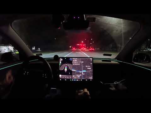 Tesla FSD 14.2.1 moves slightly over when human driver in a BMW comes speeding through neighborhood