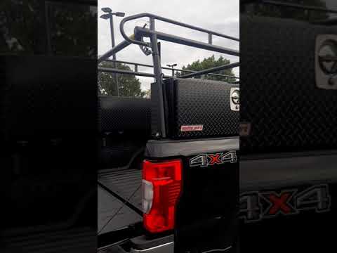 AIS installed Kargo Master Pro II Series over cab ladder rack 1700 lb, and