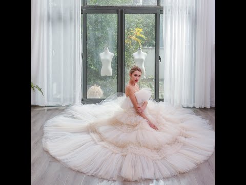 Romantic Tiered Tulle Ballgown Wedding Dress with Long Train