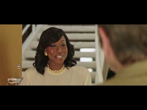 Trailer image of a jubilant courtroom corridor moment that pairs with celebratory needle-drops