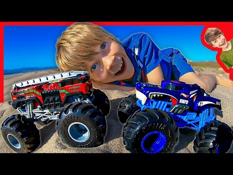 HOT WHEELS MONSTER TRUCKS AT THE BEACH WITH AXEL AND DADDY!
