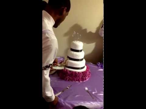 Clarence and Shayla cutting cake