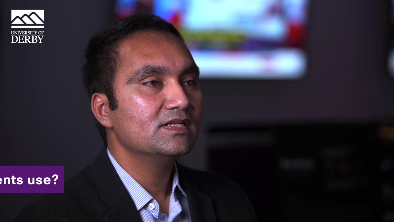 Dr Medhi Hassan, Lecturer in International Business, talking to camera.