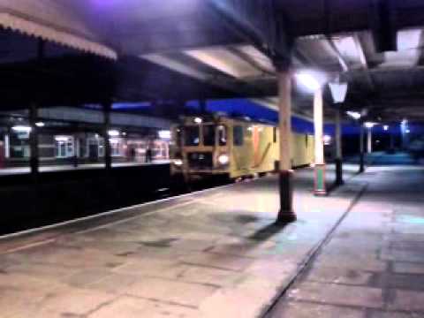 Rhyl Station 29.5.2013 - Network Rail Stoneblower DR80211 passing