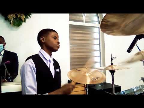 Aland Carostyl the future drummer is playing folk song Christian music kompa