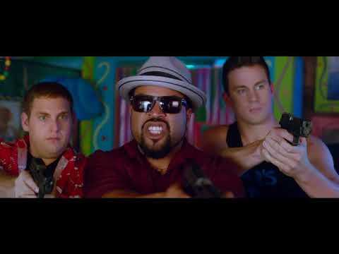 Trailer montage of Schmidt and Jenko on campus with neon party lighting