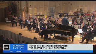 Mayor Michelle Wu plays piano with the Boston Symp