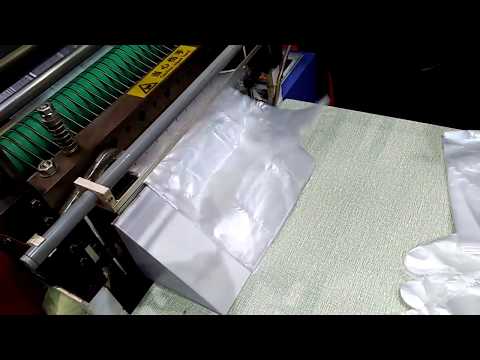 Fully Automatic Plastic Gloves Making Machine, Capacity: 130 Pcs video by Khandhala Enterprise