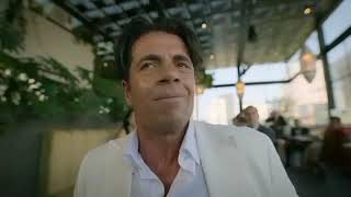 man shits his white pants in a restaurant.